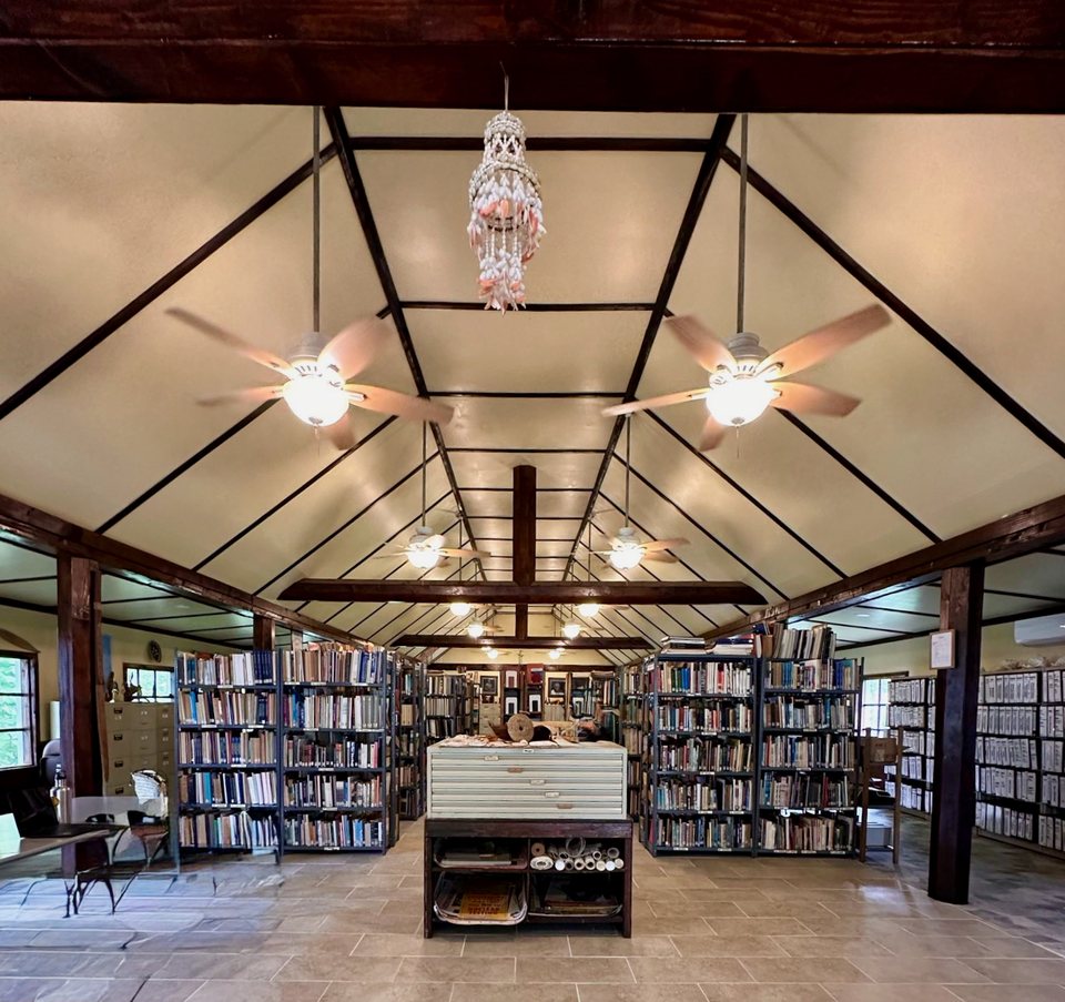 Bookshelves and reading space inside the MicSem library.